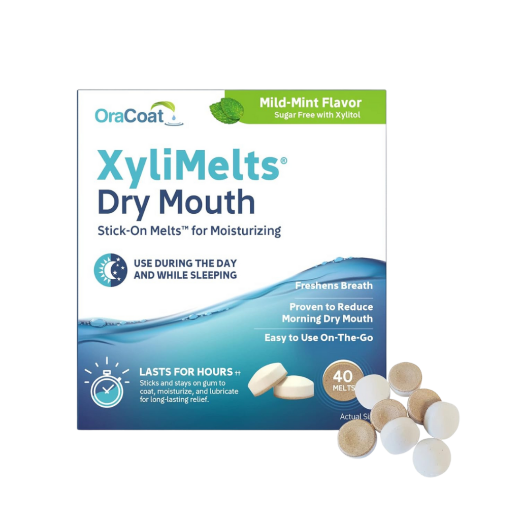 Box of OraCoat XyliMelts Dry Mouth products, mild-mint flavor, showcasing product benefits and eight round beige-and-white discs beside the box. The packaging emphasizes moisture, freshness, and ease of use.