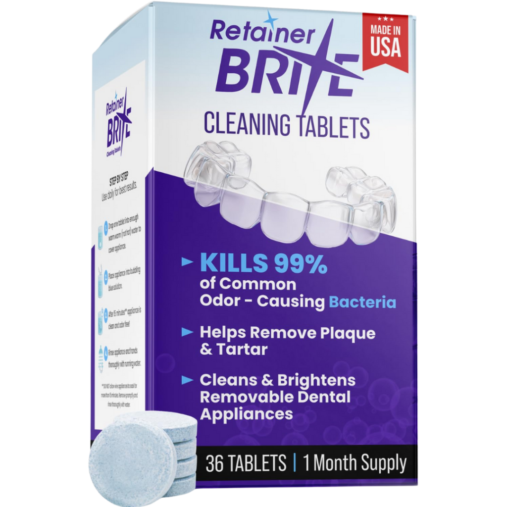 Box of Retainer Brite cleaning tablets with product details, including claims to kill 99% of odor-causing bacteria, remove plaque and tartar, and clean dental appliances. Two round blue tablets are shown in front of the products.